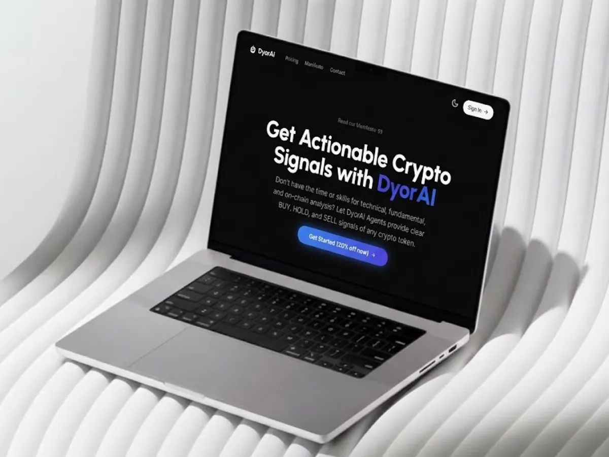The DyorAI home page on a laptop