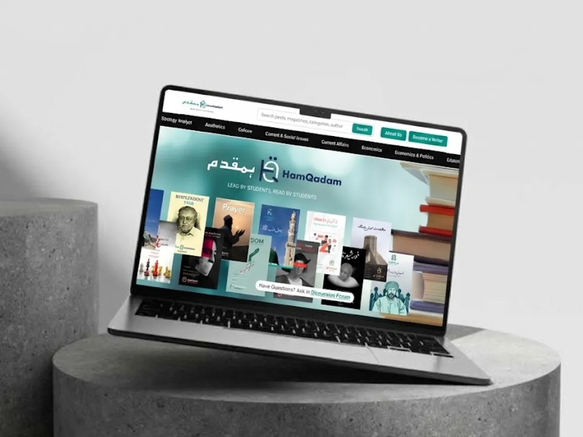 The Hamqadam magazine home page on a laptop